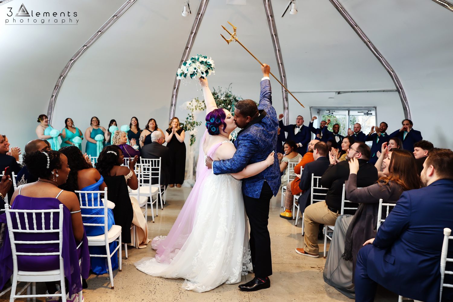 After ceremony kiss with trident
