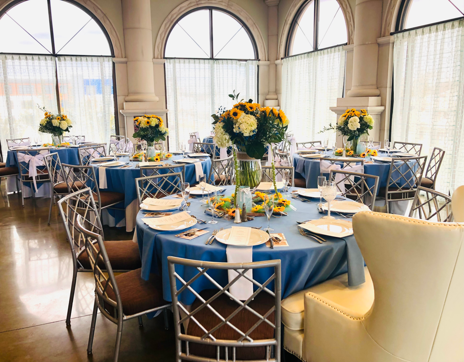 Table settings with sunflowers for bridal shower